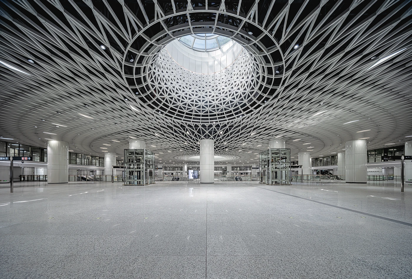 Gangxia North hub: the 'Eye of Shenzhen' lattice skylight above the main concourse